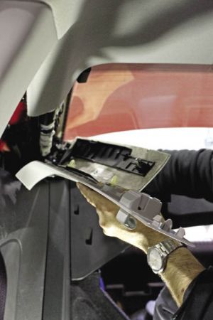 From the head unit, the RCAs are fed along the kick panels from the side steering column and will eventually power the rear speakers.