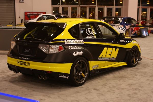 AEM's latest creation was at the Subaru booth complete with full Clarion install