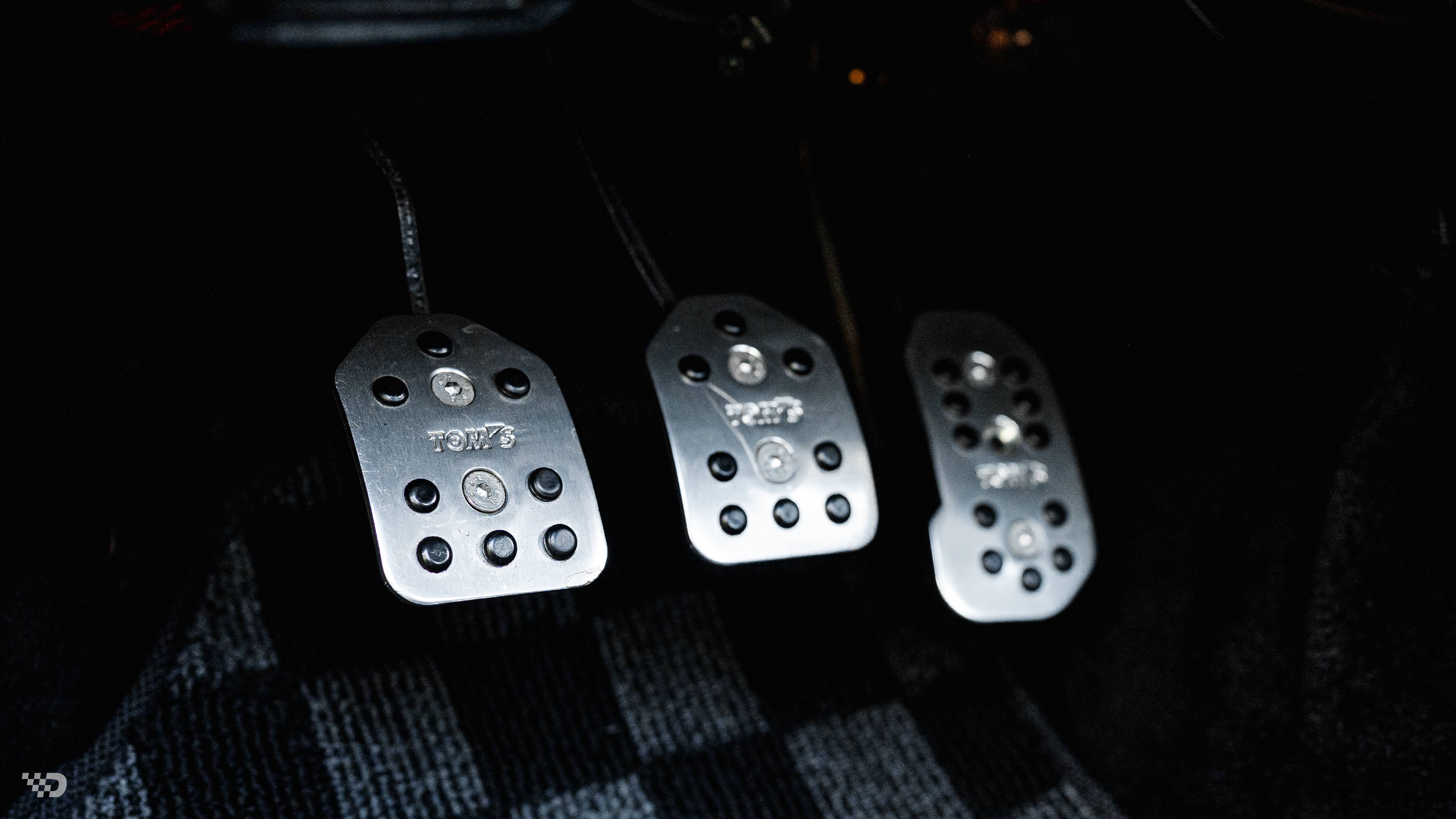 TOM’S aluminum pedal set installed in AE86 driver footwell.