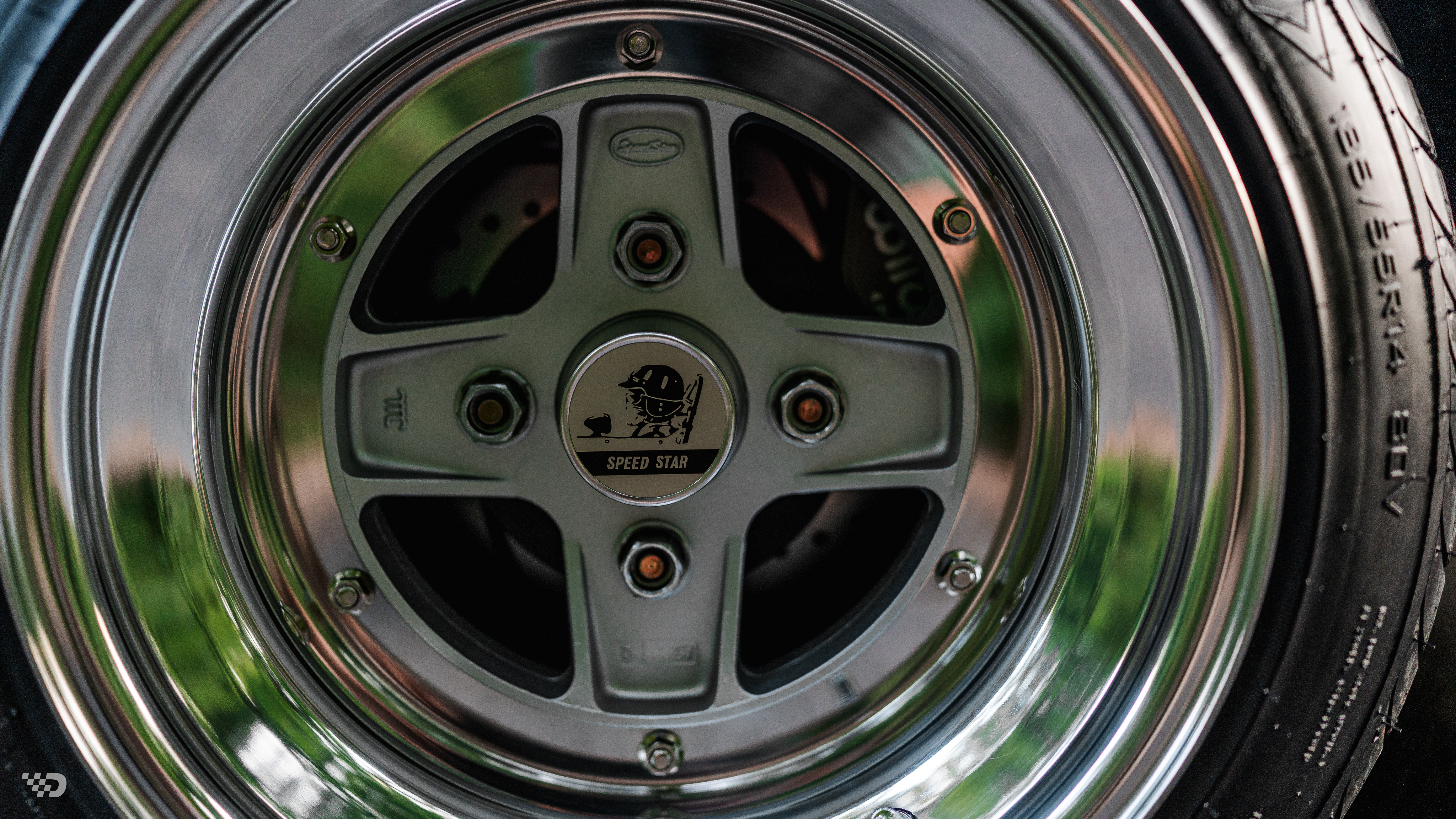 Close-up of SSR MKII wheel with polished lip and Speed Star center cap.