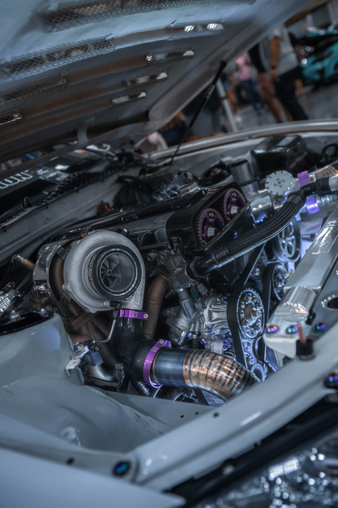 Turbocharged 2JZ-GTE engine bay in Aum Sung’s 1992 Lexus SC400 featuring a Precision 6466 turbo and custom performance components.
