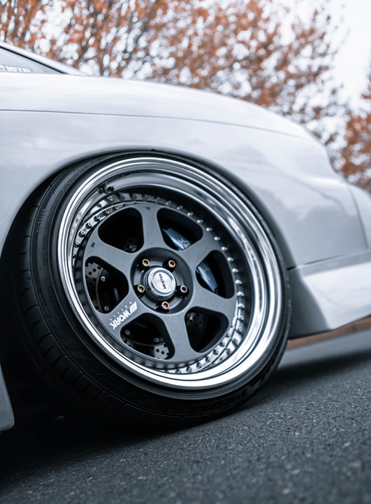 Close-up of a Work Meister L1 wheel and Toyo tire setup on Aum Sung’s lowered 1992 Lexus SC400.