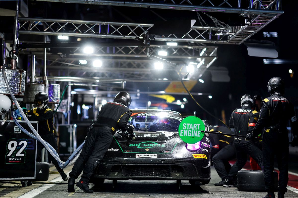 Porsche 911 GT3 R race car in the pit lane during the CrowdStrike 24 Hours of Spa.
