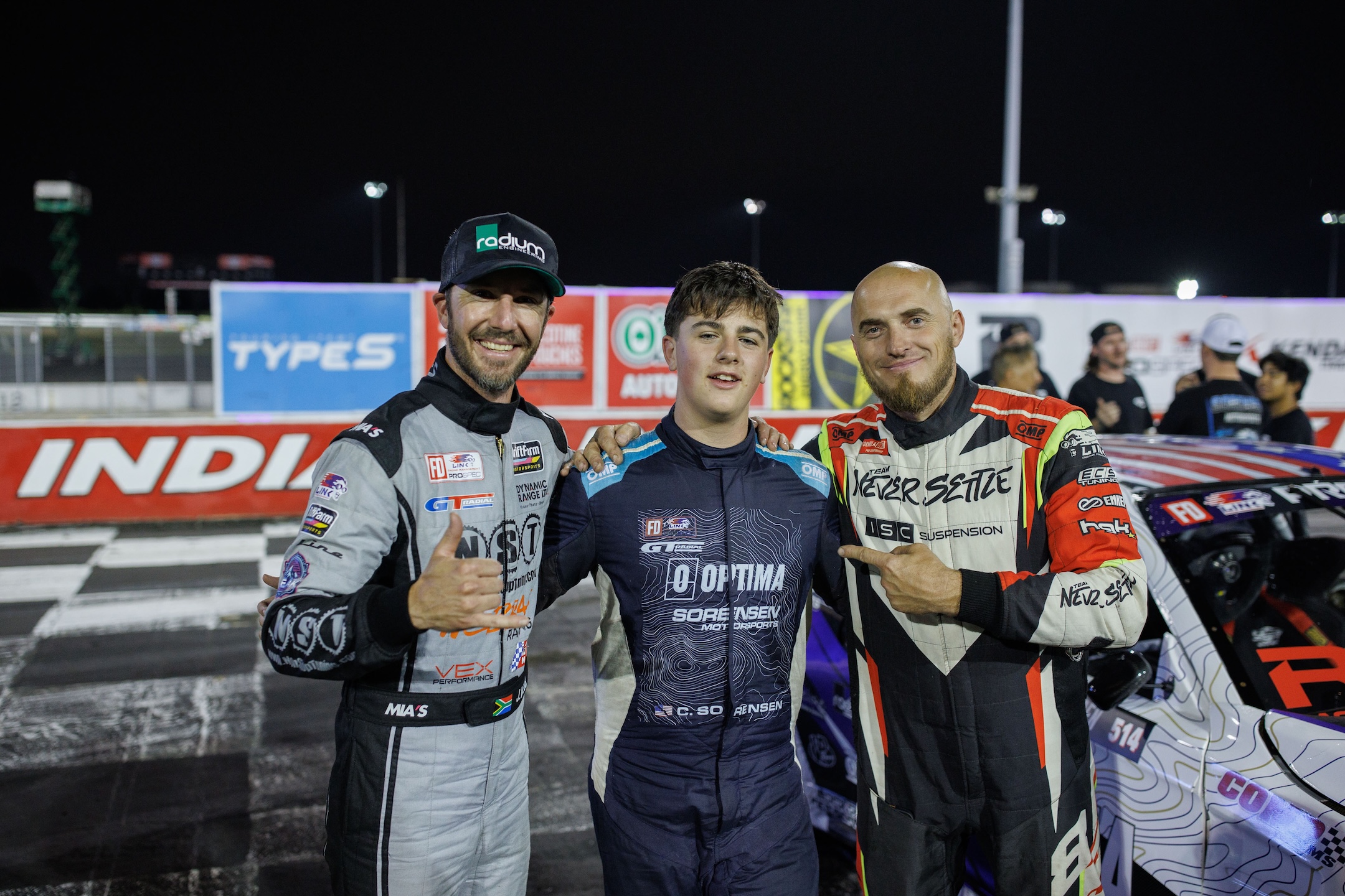 Jason Webb, Camren Sorensen, and Dmitriy Brutskiy pose after Formula DRIFT PROSPEC Round 3 at Lucas Oil Indianapolis Raceway Park in 2026.