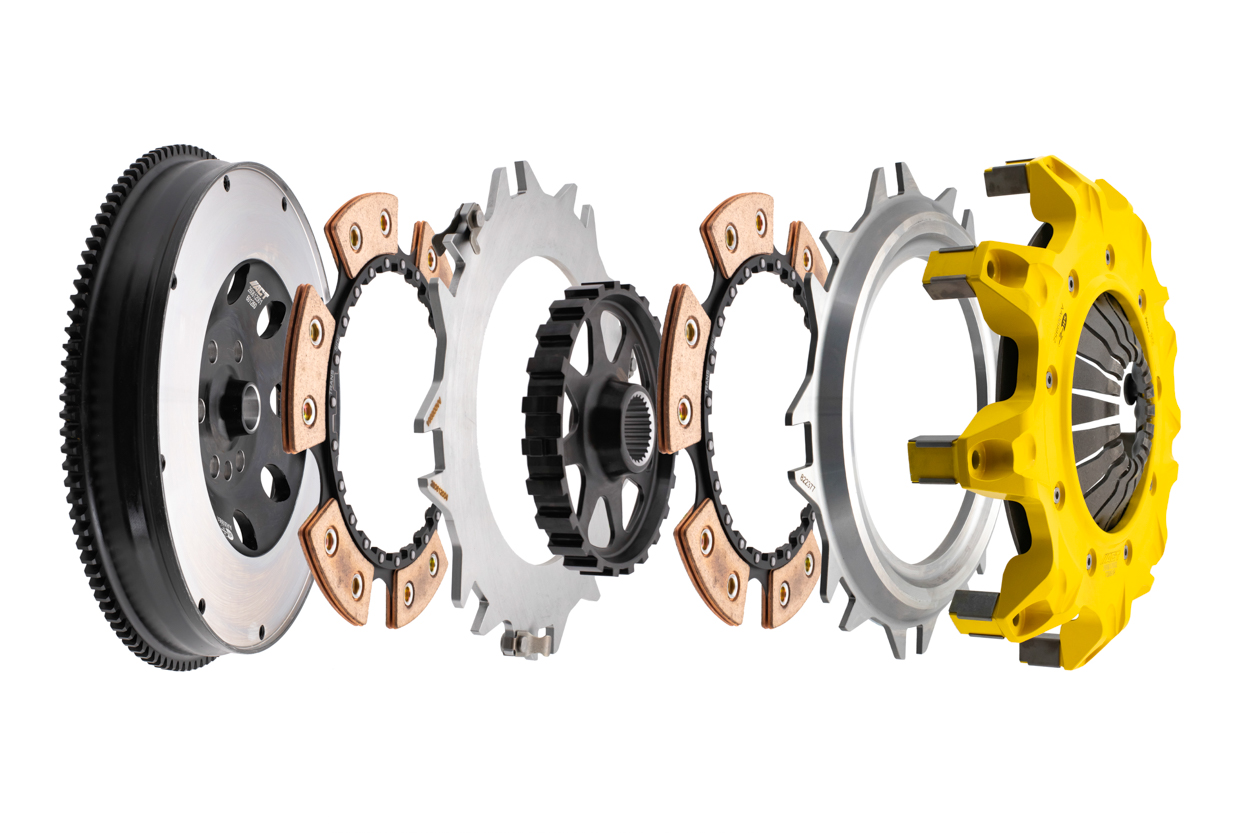 ACT 225mm Mod-Twin clutch kit for BMW N54 and N55 engines shown in exploded view with twin-disc assembly, Mono-Drive hub, XACT Streetlite flywheel, friction discs, floater plates, and yellow pressure plate.