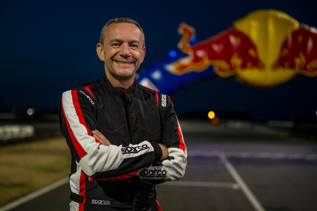 Max vs 100 Race Director David Terrien at the purpose-built karting circuit at Silverstone.