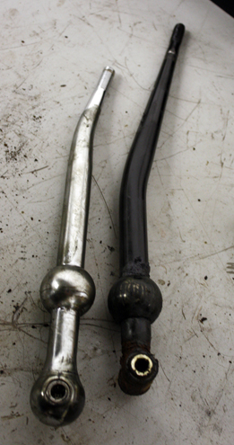 Side by side comparison of shirt shifter (left) and stock shifter (right)